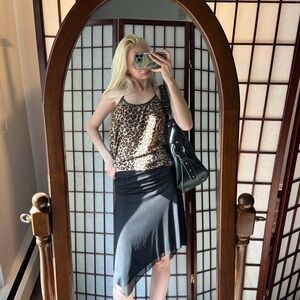 le chateau Black Asymmetrical Midi Skirt with Sheer Hem